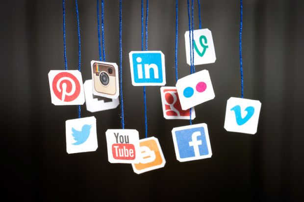 social-media-icons-hanging-from-blue-string.jpg