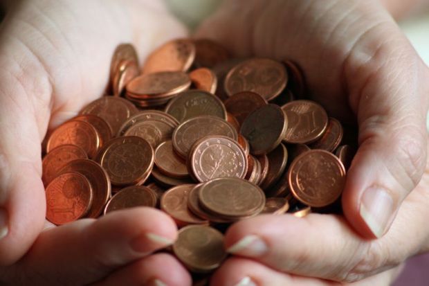 euro_cents_in_hands.jpg