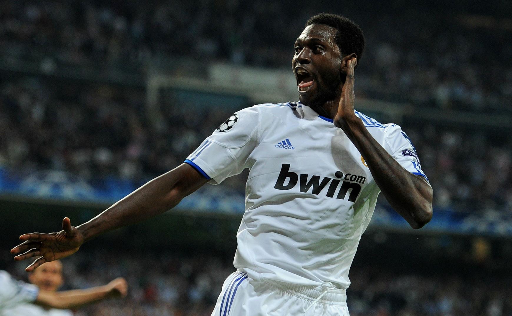 emmanuel-adebayor-real-madrid_1a7ghuzib79k51bnr1b438nh8m.jpg