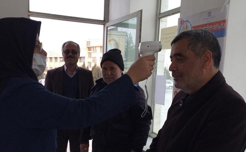 عکس تب سنجی همکاران واحد شیروان 1.jpg