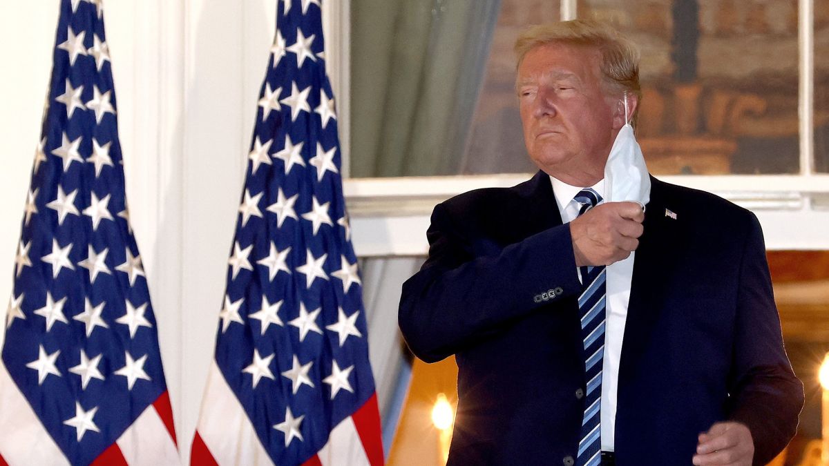 https___cdn.cnn.com_cnnnext_dam_assets_201005192147-03-trump-arrives-white-house-1005-removes-mask.jpg