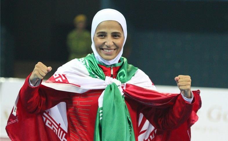 Nasimeh_Gholami_with_Iran's_flag.jpg