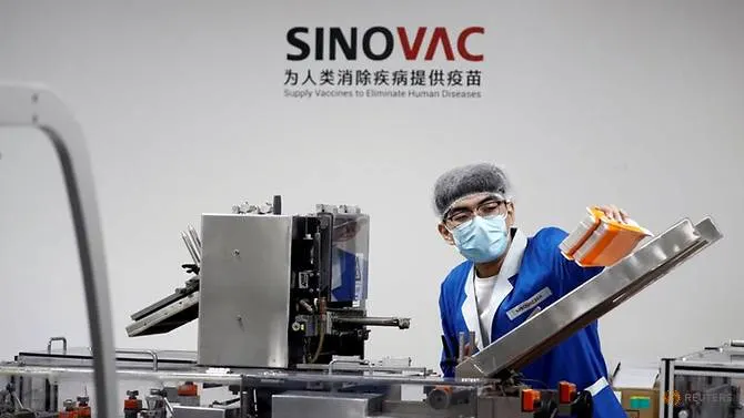 Screenshot_2020-12-18 file-photo--media-tour-at-chinese-vaccine-maker-sinovac-biotech-in-beijing-1 webp (WEBP Image, 670 × [...].png