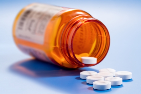 24930469-pills-in-a-bottle.jpg