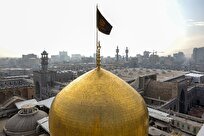پرچم عزا بر فراز گنبد امام رضا(ع) برافراشته شد