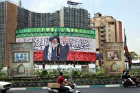 اکران تصاویر خانوادههای شهید حملات رژیم صهیونیستی در میدان ولیعصر تهران