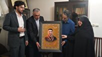 ادای احترام به خانواده شهید بازیساز جنگ تحمیلی ۱۲ روزه