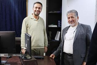 بیژن رنجبر رییس دانشگاه آزاد اسلامی و حامد جعفرنژاد مدیر گروه عکس خبرگزاری آنا