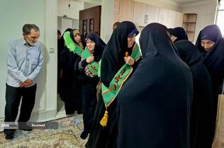 دیدار خادمیاران و یاوران رضوی با خانواده شهید طاها عبدی