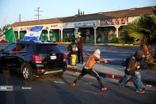 درگیری پلیس ضد شورش و معترضان در لس&zwnj;آنجلس آمریکا