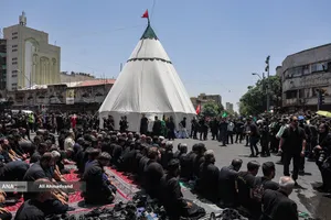 آیین خیمه سوزان عاشورا در چهارراه گلوبندک تهران
