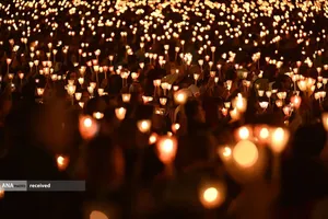 زائران در مراسم جشن شخصیت حضرت فاطمه(س) در زیارتگاه روستای فاطیما، پرتقال