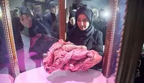کاپشن-خونی-ملینا-به-موزه-کرمانشاه-اهدا-شد