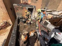 مهار  آتش‌سوزی در پشت‌بام پاساژ بازار تهران؛ ۱۵ کپسول گاز شعله‌ور بود