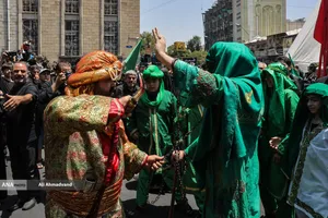 آیین خیمه سوزان عاشورا در چهارراه گلوبندک تهران
