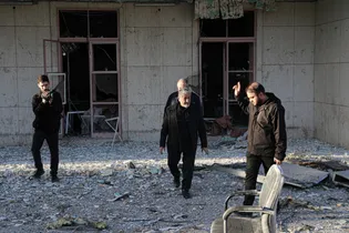 Head of Islamic Azad University Visits Former US Embassy After US-Israeli Strike