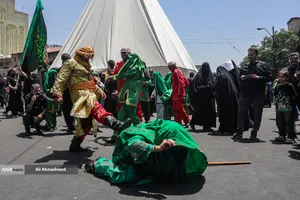 آیین خیمه سوزان عاشورا در چهارراه گلوبندک تهران
