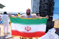 عجمی پرچمدار کاروان شهدای ناو دنا در مراسم اختتامیه بازی های ساحلی آسیا